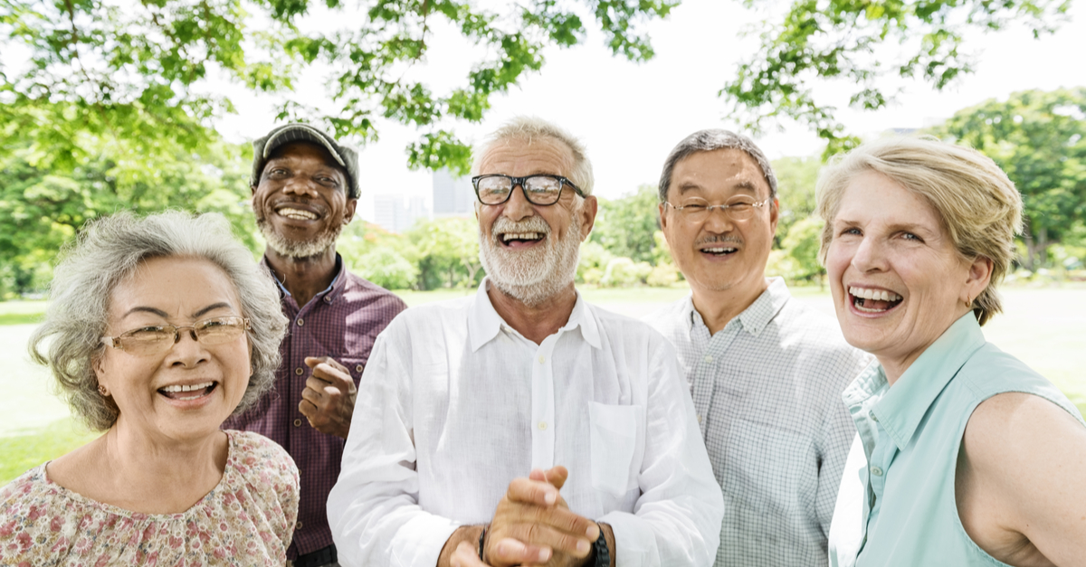 Happy senior friends enjoying the weather outside