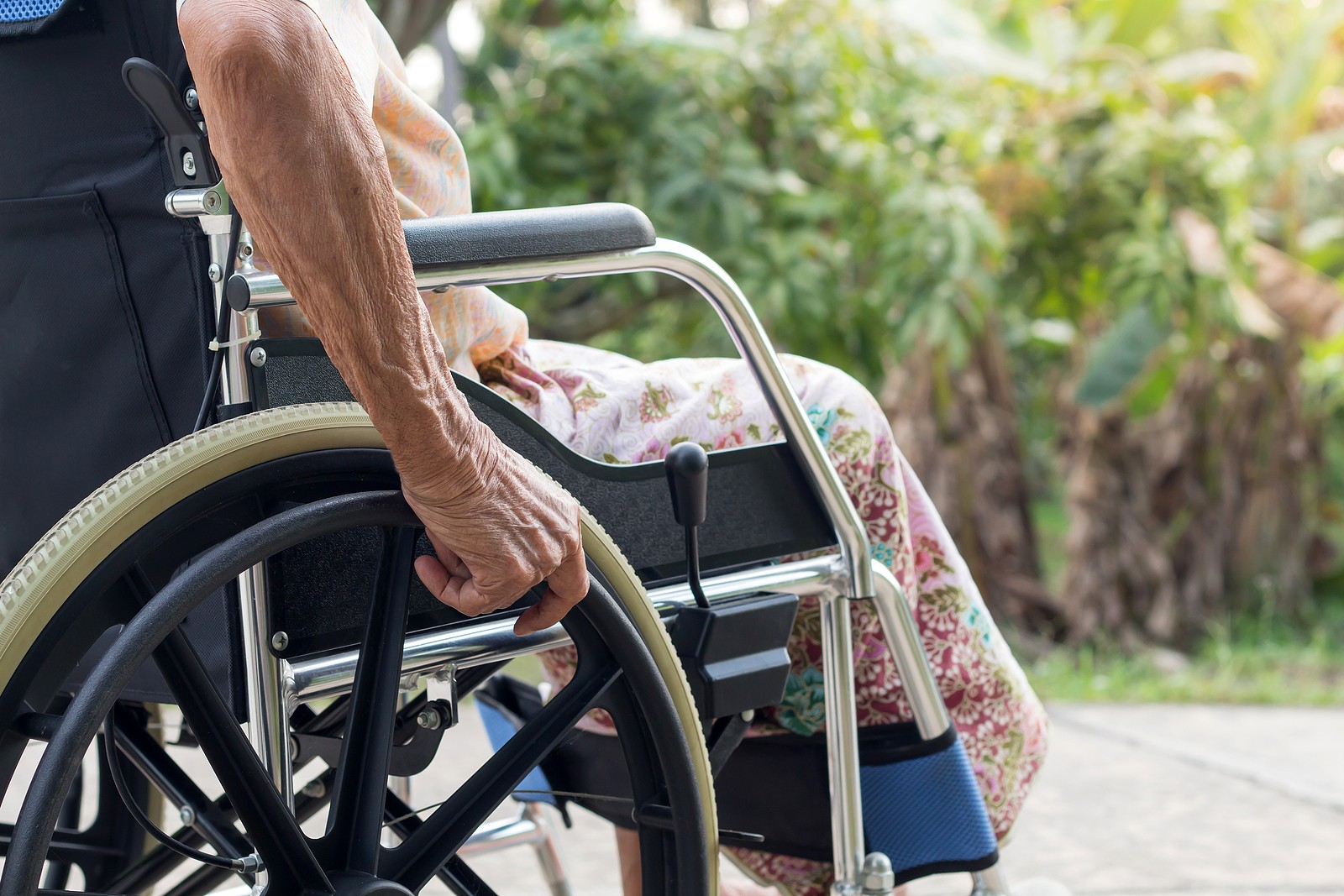 Senior with multiple sclerosis in a wheelchair