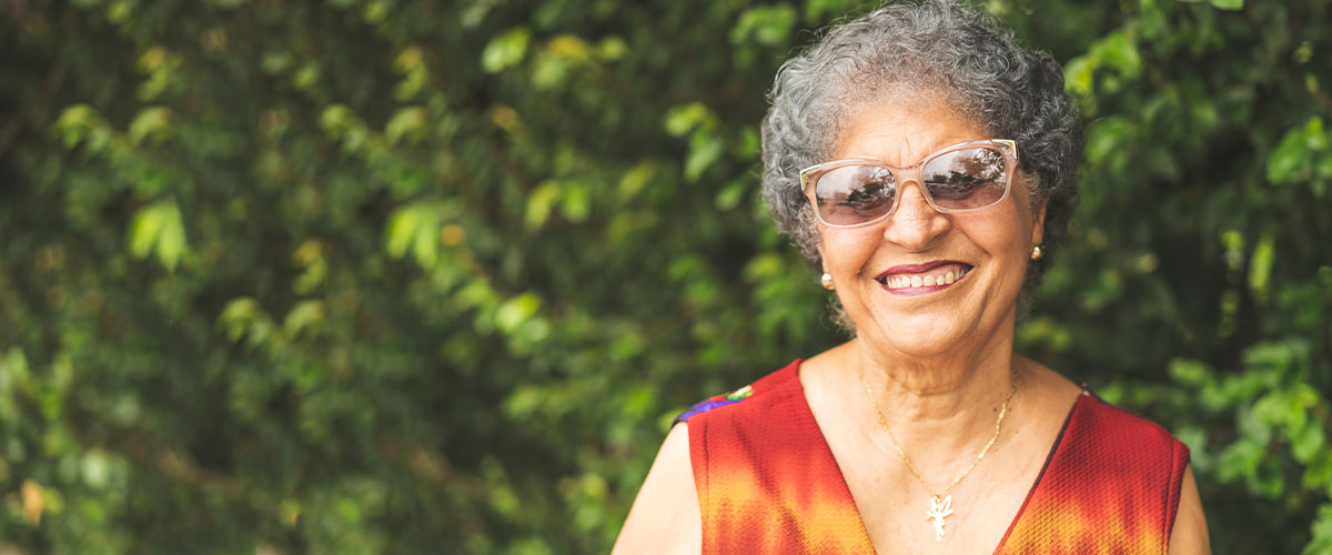 Senior woman smiling outdoors