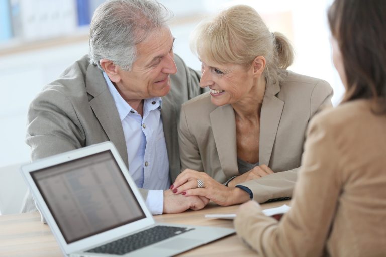 seniors talking with a professional about financing senior living