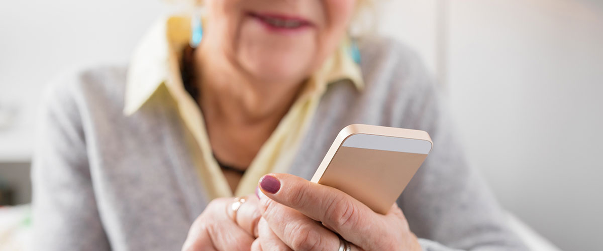 Senior woman using her smart phone