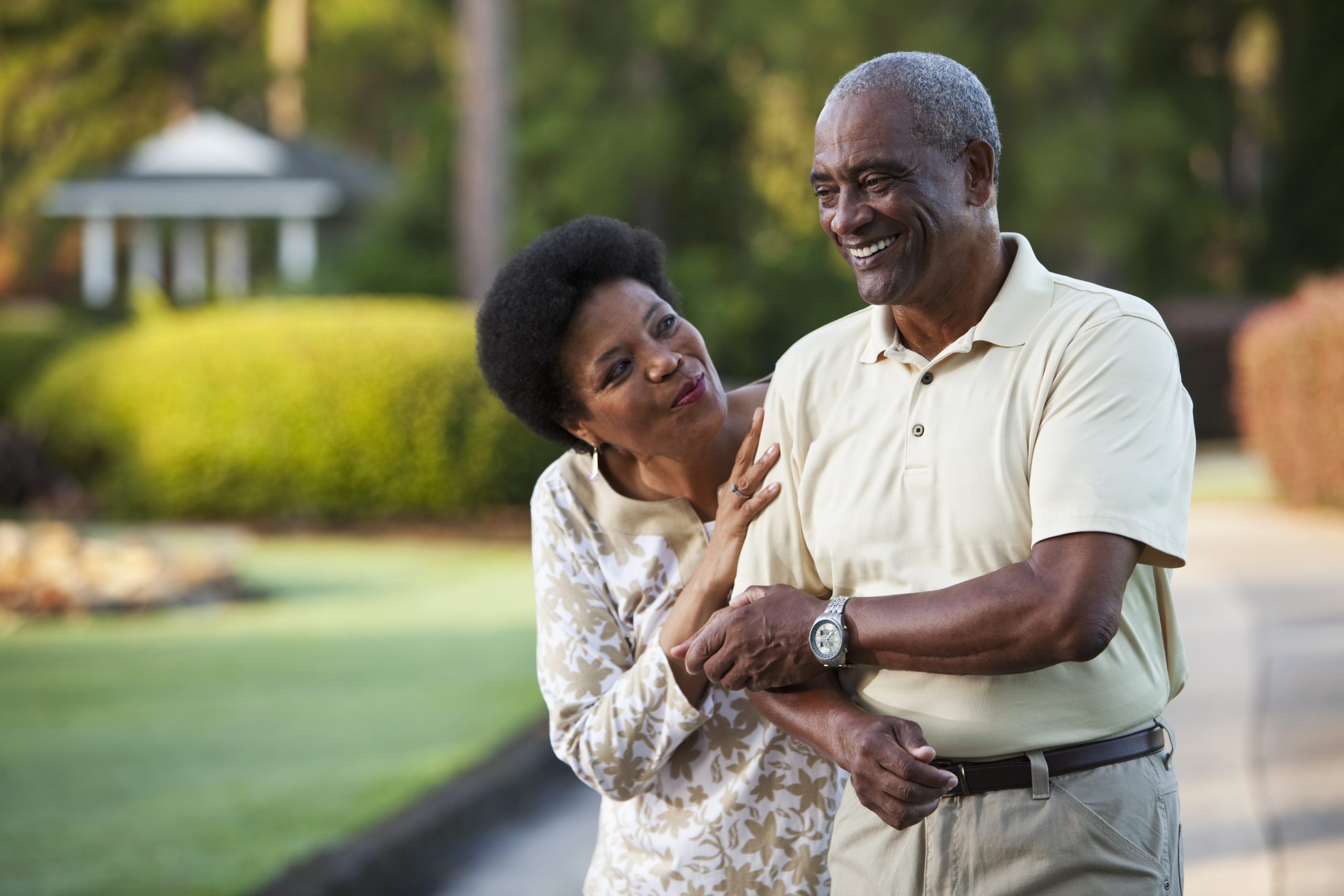 Senior couple on walk while arm in arm